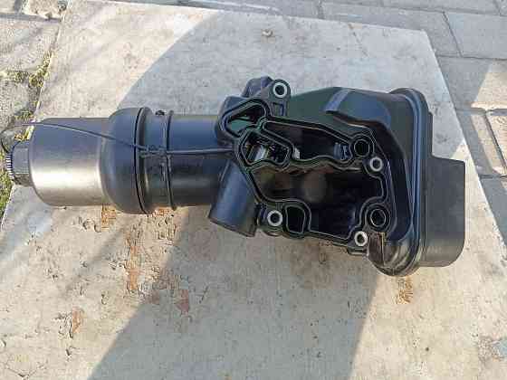 Продам Корпус масляного фильтра Skoda Octavia (A5 1Z-) 2004-2013. 06D115397J VAG (оригинал б/у Донецк