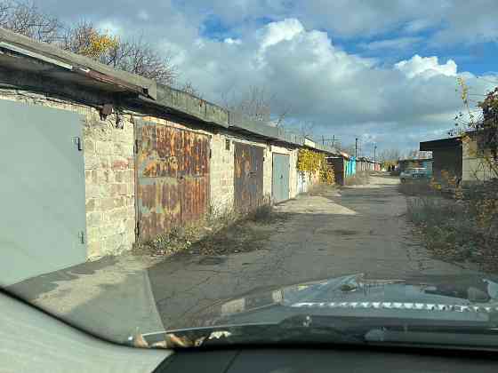 Капитальный двухуровневый гараж с охраной продам Донецк
