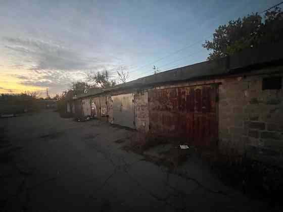 Капитальный двухуровневый гараж с охраной продам Донецк