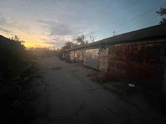 Капитальный двухуровневый гараж с охраной продам Донецк