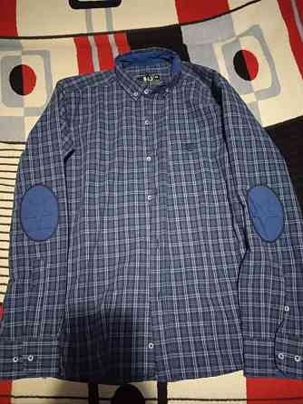 Продам новую рубашку на мальчика Макеевка