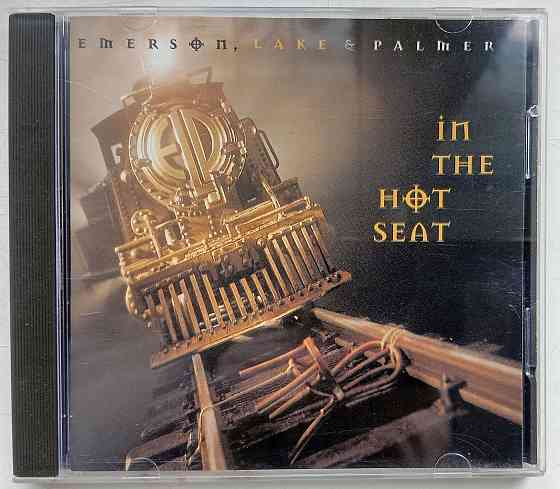 Emerson Lake & Palmer (1994) In The Hot Seat: CD, Germany (аудио компакт диск) Макеевка