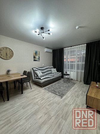 Уютная двухкомнатная квартира с панорамным видом в центре города Мариуполь - изображение 1