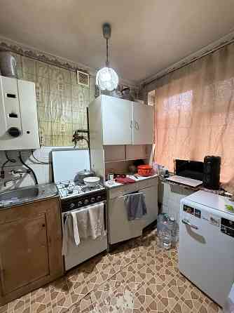 Продам 2-х комн. квартиру 2/5 в Червоногвардейском районе центр - улица Малиновского Макеевка