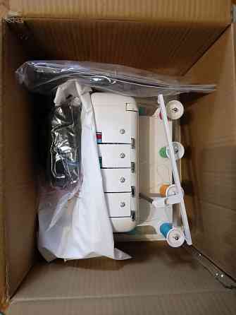 Новая Швейная машинка оверлок Донецк