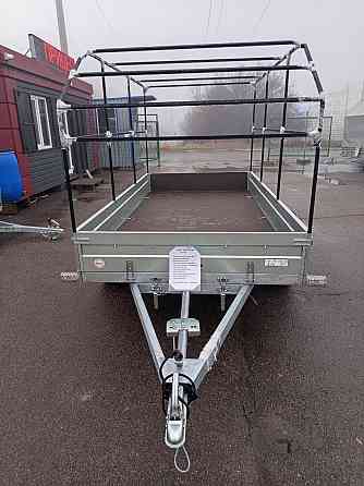 автомобильный прицеп viking 2 оси 1530 с тент 100 мм скос Донецк