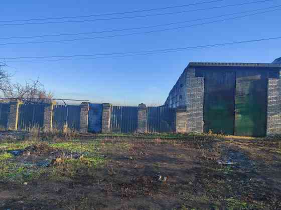 Продам земельный участок и гараж Макеевка