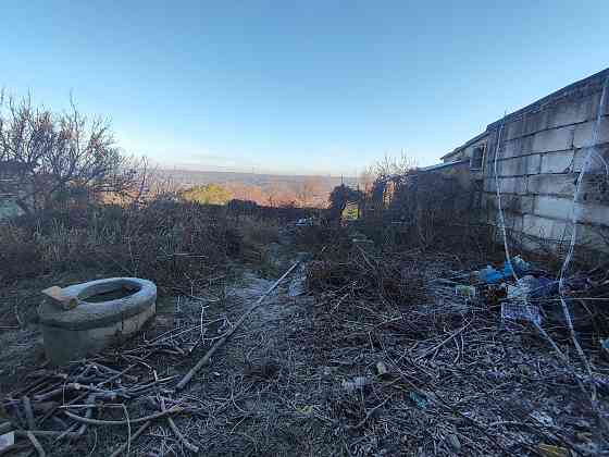 Продам земельный участок и гараж Макеевка