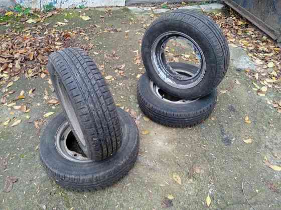 Продам комплект летних колес Таврия Славута в сборе с дисками. Донецк