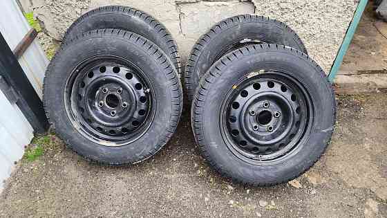 Продам комплект новой резины на оригинальных корейских штампах R15. Донецк