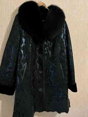 Продам дубленку натуральную в отличном состоянии, размер 50, черная Донецк