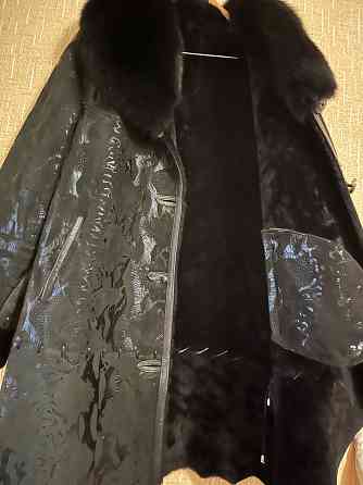 Продам дубленку натуральную в отличном состоянии, размер 50, черная Донецк
