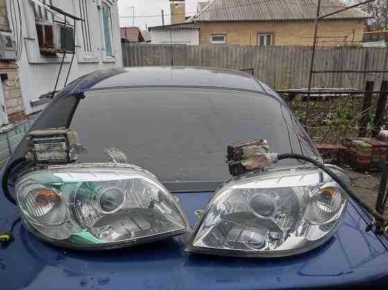 Продам фары Шевроле Авео Т250 2006 г. на линзах би/ксенон б/у Донецк