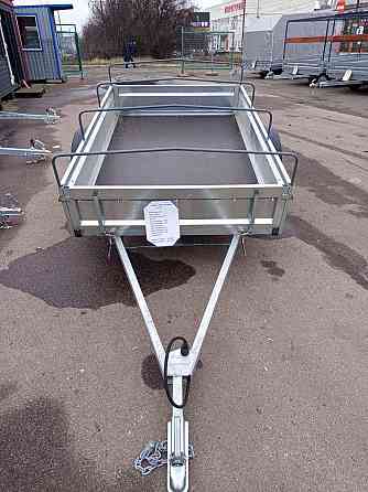 прицеп уралец 2*1,3 ,борт 300 мм.тент 250 мм Донецк