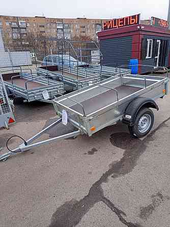 прицеп уралец 2*1,3 ,борт 300 мм.тент 250 мм Донецк