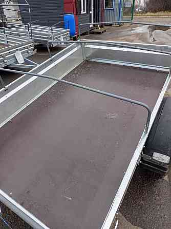 прицеп уралец 2*1,3 ,борт 300 мм.тент 250 мм Донецк