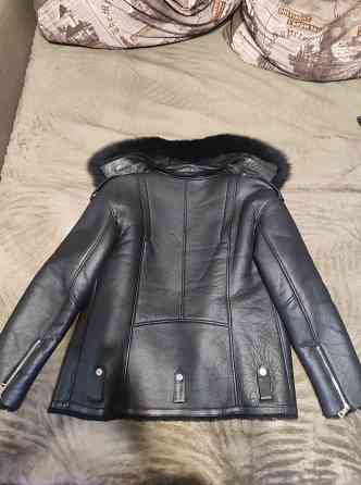 Продам натуральную дублёнку.Мягкая, тёплая с натуральным мехом. Донецк