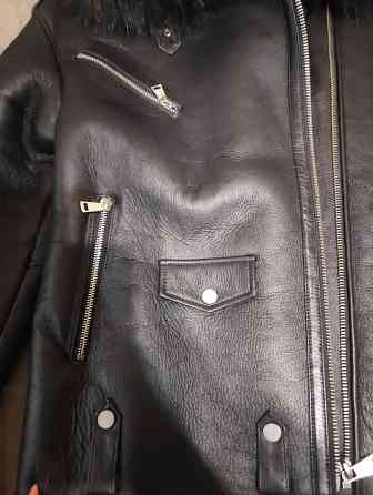 Продам натуральную дублёнку.Мягкая, тёплая с натуральным мехом. Донецк