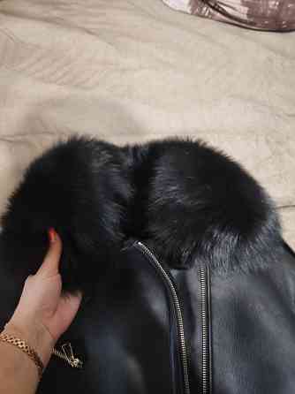 Продам натуральную дублёнку.Мягкая, тёплая с натуральным мехом. Донецк