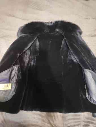 Продам натуральную дублёнку.Мягкая, тёплая с натуральным мехом. Донецк