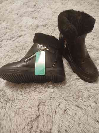 Продам новые зимние сапожки Донецк