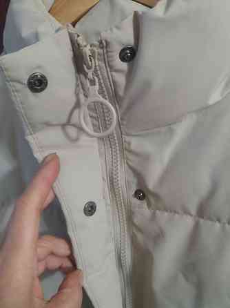 Продам куртку пуховик р.52 Донецк