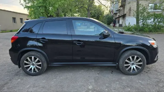 Mitsubishi Outlander Sport Красный Луч