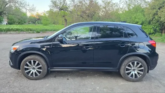 Mitsubishi Outlander Sport Красный Луч