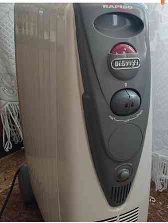 Продам эл.камин масляный 9секций Донецк