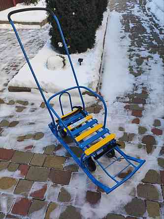 Санки детские с механизмом выдвижных колесных шасси , с 4 -мя колесами Донецк