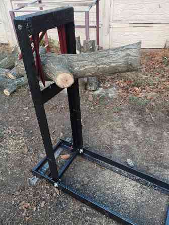 Металлический держатель дерева для распиливания дров Макеевка