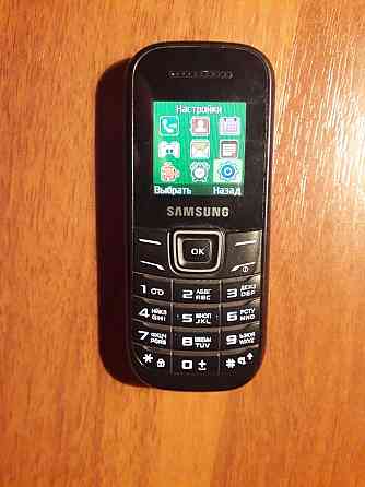 Samsung GT-E1200i+зарядное+кож чехол Донецк