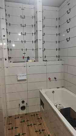 монтаж плитки любых размеров.Монтаж сан.узлов и душевых кабин с красивой розуклонкой поддонов. Донецк