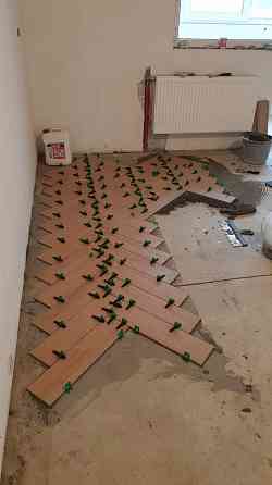 монтаж плитки любых размеров.Монтаж сан.узлов и душевых кабин с красивой розуклонкой поддонов. Макеевка