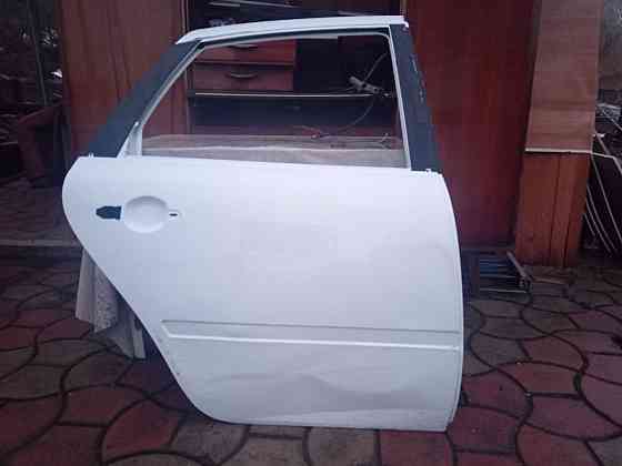 Продам дверь б/у,Лада гранта,задняя правая. Донецк