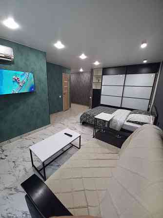 напротив парка гуливер Донецк