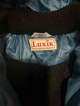 Новая куртка(пальто) пуховик Донецк