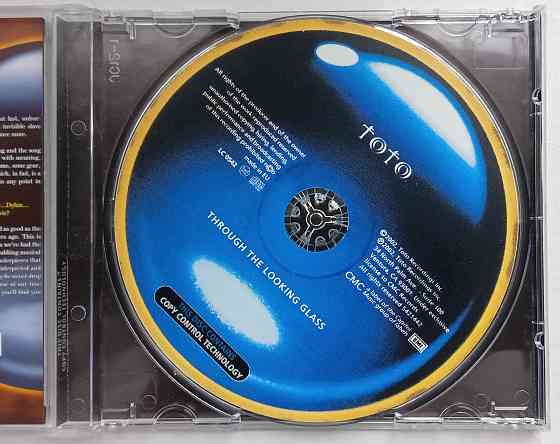 Toto (2002) Through The Looking Glass - CD, Россия, неоф. Макеевка