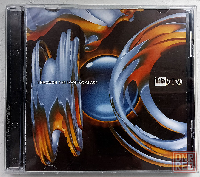 Toto (2002) Through The Looking Glass - CD, Россия, неоф. Макеевка - изображение 1