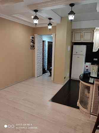 Продам 4-х комнатную квартиру в Ясиноватой с дизайнерским ремонтом Ясиноватая