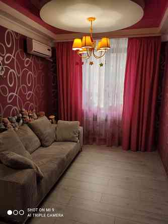 Продам 4-х комнатную квартиру в Ясиноватой с дизайнерским ремонтом Ясиноватая