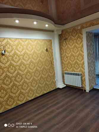 Продам 4-х комнатную квартиру в Ясиноватой с дизайнерским ремонтом Ясиноватая