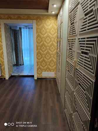 Продам 4-х комнатную квартиру в Ясиноватой с дизайнерским ремонтом Ясиноватая