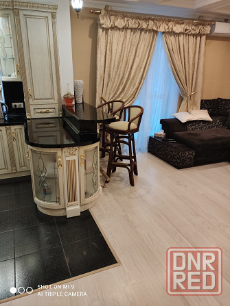 Продам 4-х комнатную квартиру в Ясиноватой с дизайнерским ремонтом Ясиноватая - изображение 1