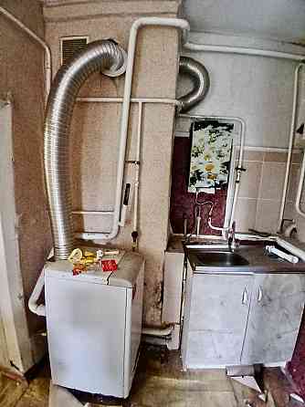 Продается небольшой Дом с приватизированным земельным участком. Мариуполь