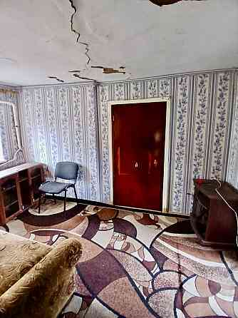 Продается небольшой Дом с приватизированным земельным участком. Мариуполь