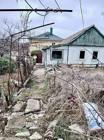 Продается небольшой Дом с приватизированным земельным участком. Мариуполь