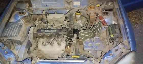 Есть Ланос на разбор двигатель бампер коробка сидушки торпеда Донецк