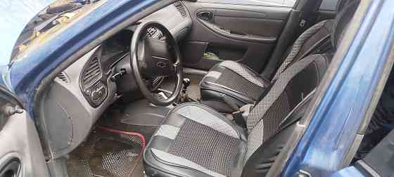 Есть Ланос на разбор двигатель бампер коробка сидушки торпеда Донецк