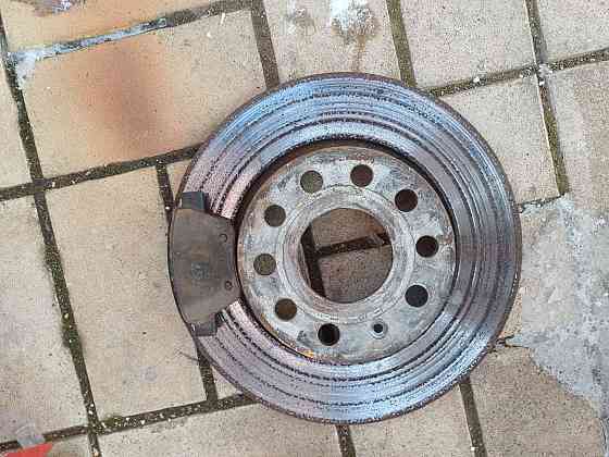 Продам комплект задних тормозных дисков и колодок для Шкоды Октавия А5 Донецк